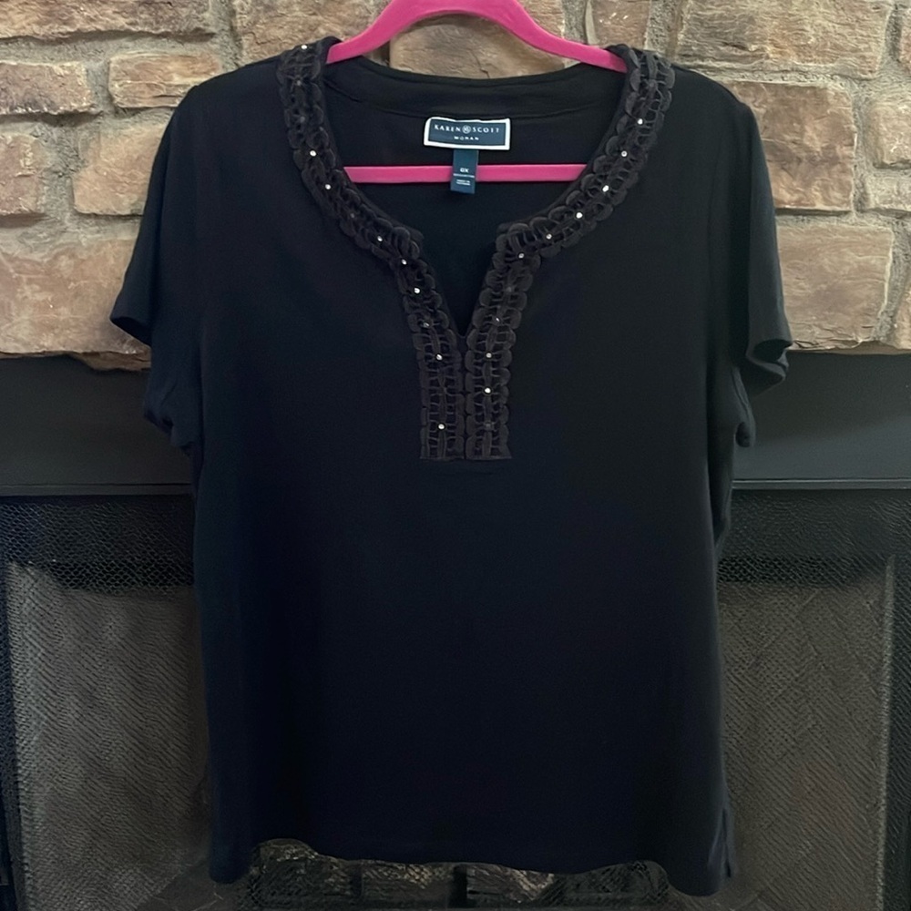 Karen Scott black v-neck top with lace neckline, silver embellishments. Size OX